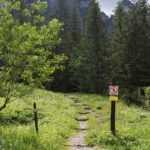 mountain path with a no entry sign