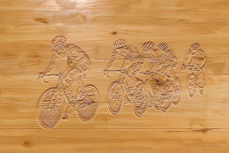 The front of the cycling peloton depicted as a wooden sculpture
